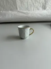 Foto 4 von Kaffee- und Mokkatassen mit Unterteller aus Porzellan Weiß-Gold